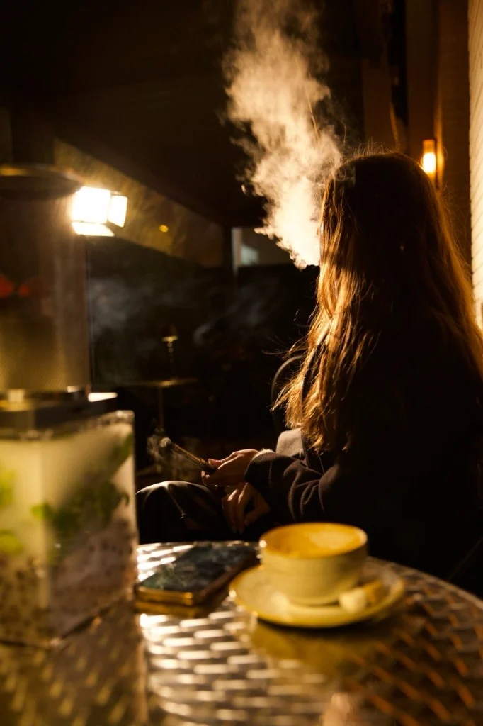 Tea and smoke on the night terrace