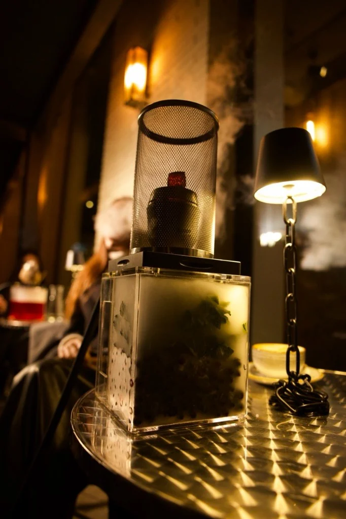 Cube shisha, lamp and tea at night